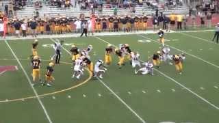 High school football player gets helmet twisted backwards during run