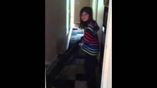 Hannah vacuuming