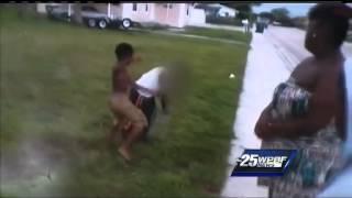 Police say video shows woman encouraging kids to fight