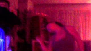 Priscilla whipping her hair back and forth