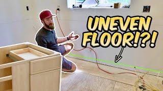 Installing Kitchen Cabinets on an Uneven Floor?!?