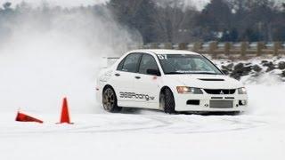 Evo 9 racing on ice with Studded Tires, 500HP!  Boosted Films