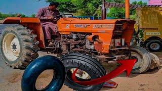 how to puncture front tire of tractor full video amazing work ٹریکٹر کے ٹائر کو پنچر لگانے کا عمل