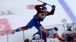 Nathan MacKinnon Blows Up Alexander Romanov