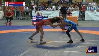 1/4 FS - 57 kg: O. GOGAVA (GEO) v. N. SANAYEV (SAN (KAZ)