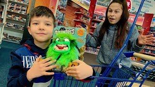 Den and the green monster in the toy store