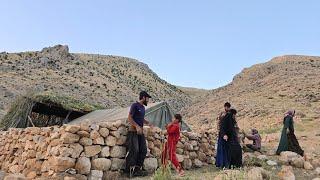 Nomadic life up close: Building house walls with hands and natural stones
