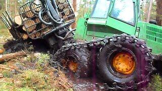 John Deere 1110D logging in mud, difficult conditions