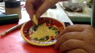 The correct way to use a french ceramic garlic grater