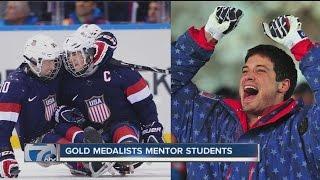 Gold medalists mentor students