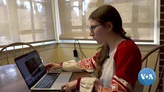 Ukrainian Teenager Watches Zelenskyy Appeal to US Lawmakers