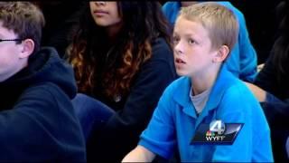 Soldier dad surprises son during school assembly