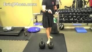 Eric Moss does a 114lbs. Stacked Kettlebell Bent Press