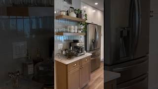 Two-toned organic modern kitchen featuring Fabuwood cabinets : IG - @designwithroyal