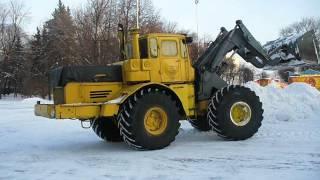 Loader TO-11 on K-701 tractor in action