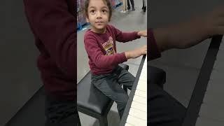 Trying Piano at Costco