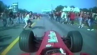 Schumacher somehow avoids hitting fans after track invasion (Italy, 2000)