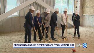 Cancer treatment tech company breaks ground on Medical Mile