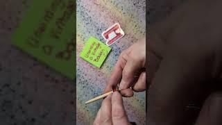 Unwinding a vintage bobbin. This was a beautiful example of someone using what they had. 