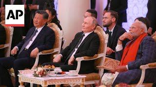 Putin hosts China's Xi Jinping and India's Narendra Modi at BRICS summit in Russia