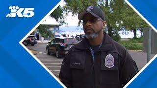 Seattle police work to apprehend suspect who fled into water after shooting at officer
