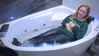 Girl enjoying a clothed bath in the Jacuzzi