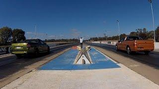 DRAG RACE: Ford Falcon XR6 Turbo ute vs Holden SS V Redline ute