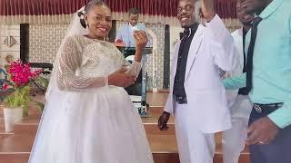 MATHIAS NYOMBI WEDS  PASTOR JOLLY LWASA  AT Redeemed Church Bunamywa