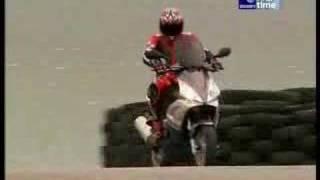 Suzuki Swift vs Peugeot scooter