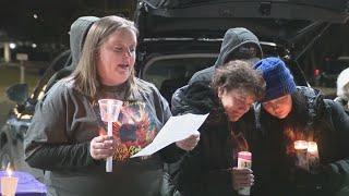 Vigil held at car wash for first victim in crime spree