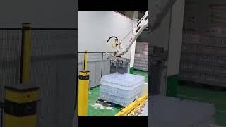 Robot palletizer for heat shrink wrap bottles/bags #palletizing #palletizer #robot