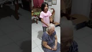 little girl massaging grandma's head #Shorts