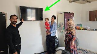 Nomadic documentary: installing TV in Khosrow's family for the first time