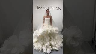 This 3D flower wedding dress is HUGE