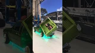 Green bed dancer watch the tires go off the ground