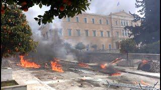 MASSIVE RIOTS in Athens, in the LARGEST demo EVER. Protesters BREACH the PARLIAMENT with MOLOTOVS