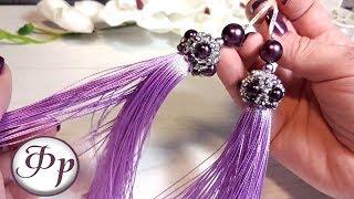 Earrings with brushes. A beautiful cap of beads and beads.