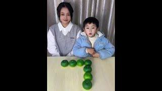 怎样移动一个橘子使橘子横竖都是5个呢？#亲子互动#数学思维#彭小澎吖