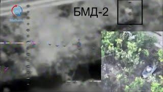 Ukrainian R-18 drones dropping munitions on Russian BMD-2s in southern Ukraine