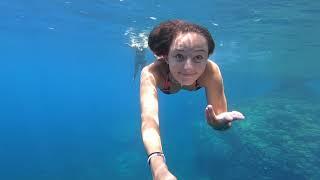 Carla Underwater jumpin and swimming in the sea.