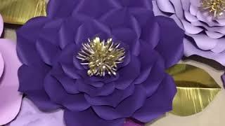 Paper flowers purple and gold theme.