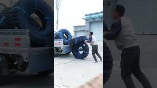 A labor saving tire loading process- Good tools and machinery make work easy