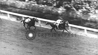 William Saunders riding horse "Omaha" wins the 1935 Kentucky Derby in Louisville,...HD Stock Footage