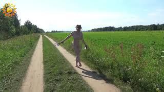 Working on a project. Bank of the river. Field. Flowers. Nature. Nudism. INF. Mila naturist.