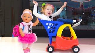 Little girl Nastya and baby doll play fun