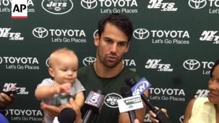 Eric Decker's Baby Son Grabs The Mic (And Chomps It)