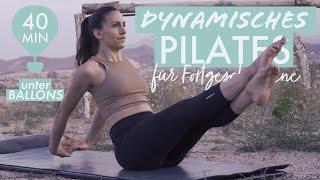 Dynamischer Pilates-Flow für Fortgeschrittene  Unter Heißluftballons