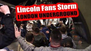 Lincoln fans storm London Underground