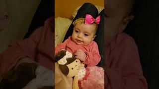 Adina sitting on RKs legs 3/25/2018