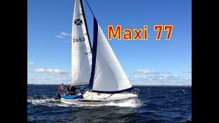Sailboat Maxi 77 sailing with furling genua and genakker